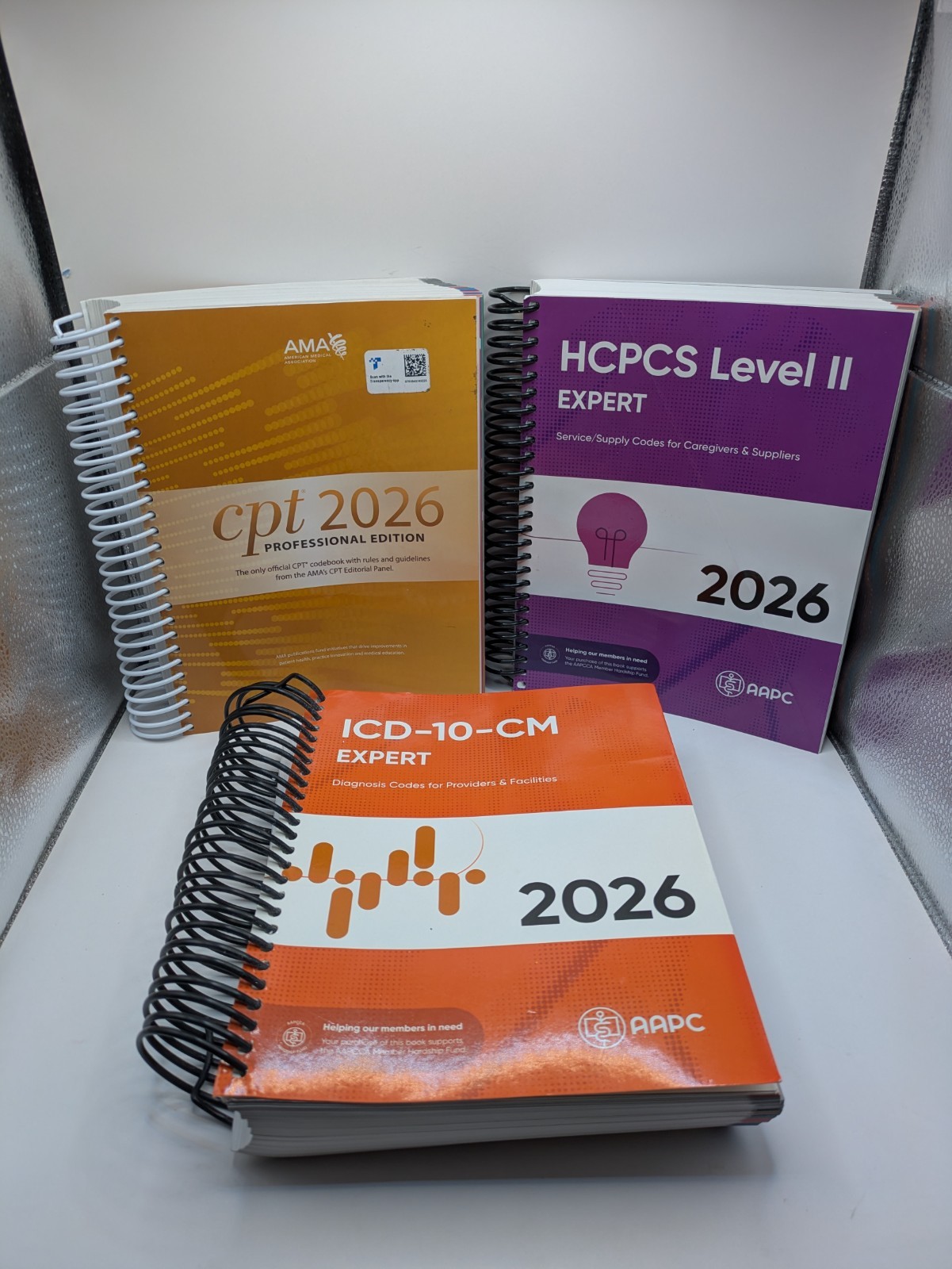 AMA 2026 CPT Book, ICD-10 Code Book, HCPCS Book – 2026 Exam Bundle by AAPC