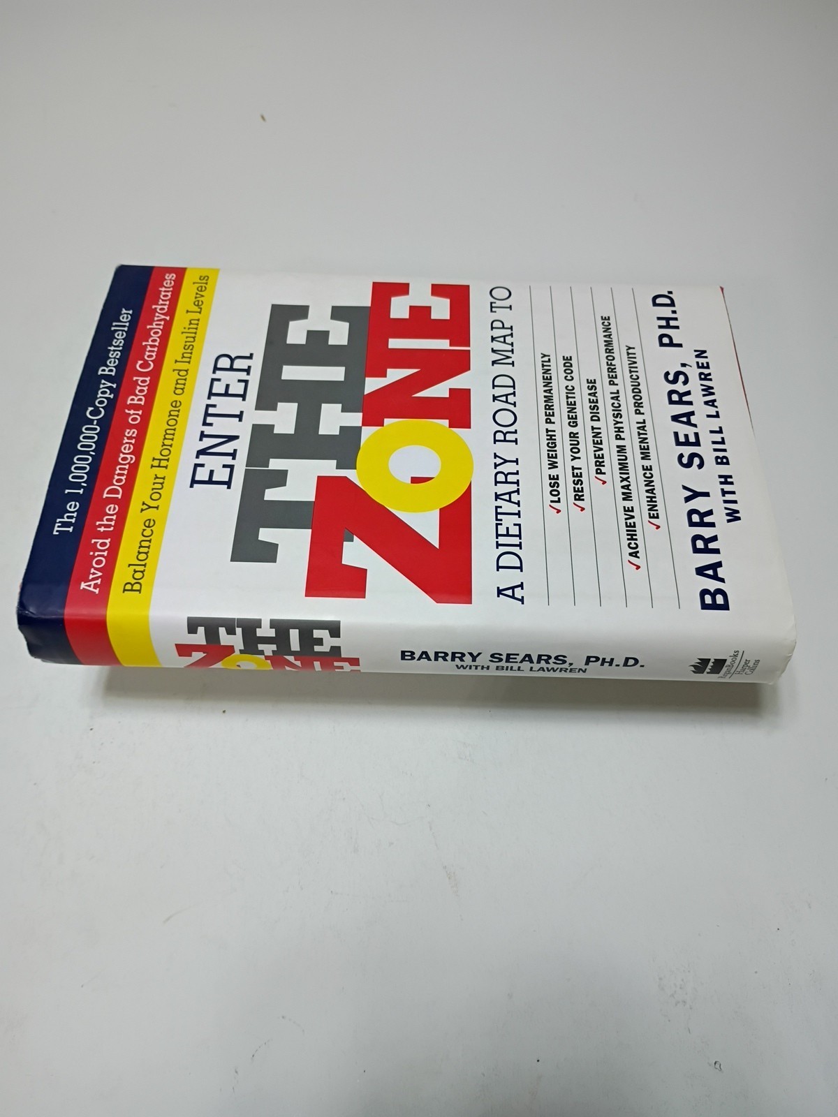Enter The Zone: A Dietary Road map , Barry Sears. Hardcover with a dust jacket